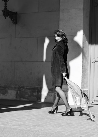 Beautiful italian woman with a waving handkerchiefの写真素材