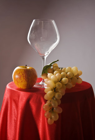 Picture of a still-life with fruit and wine glass の写真素材