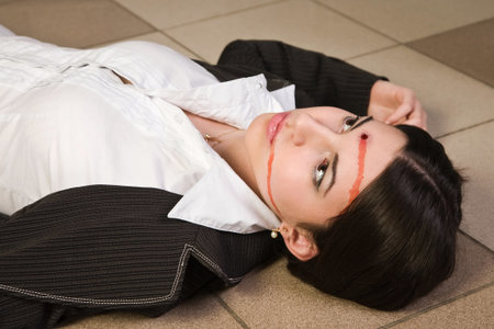 Face of the killed businesswoman in a officeの写真素材