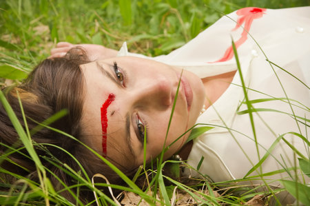 Simulation of the crime scene in a wood の写真素材