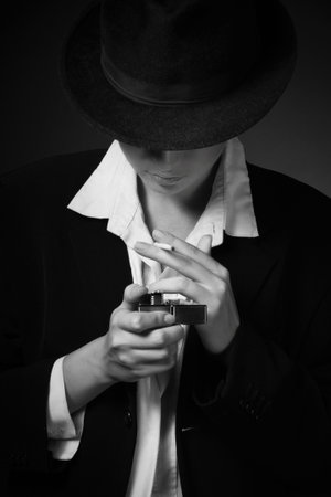 Vintage portrait of the adult woman smoking cigarette