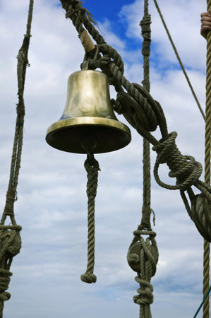 Ship bell on a background cloudy sky 

の写真素材