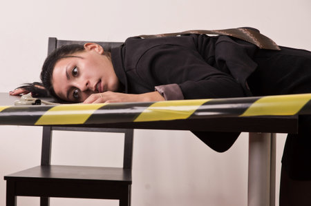 Crime scene simulation  dead secretary in a officeの写真素材