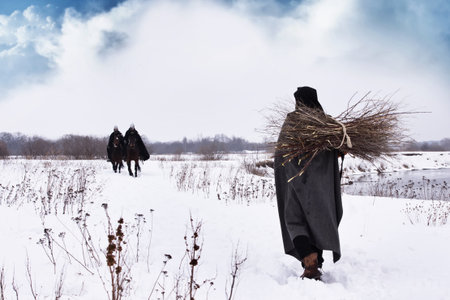 Medieval peasant with a firewood bundle and riding knights Hospitallers
の写真素材