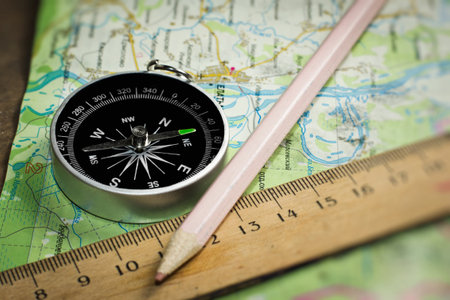 Compass, ruler and pencil on a map
の写真素材