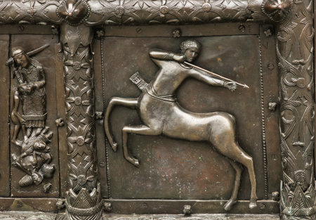 Reliefs on the gate of St. Sophia Cathedral (Novgorod, Kremlin). 11th centuryの写真素材