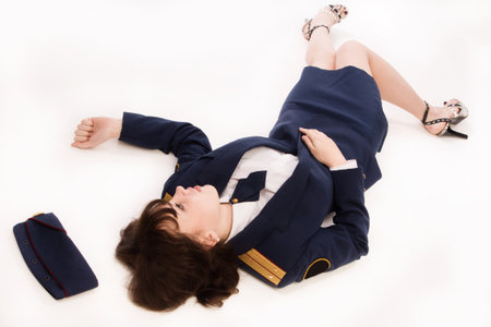 Crime scene imitation. Woman officer lying on a floor