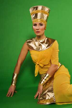 Portrait of beautiful egyptian woman in costume of the Pharaohの写真素材