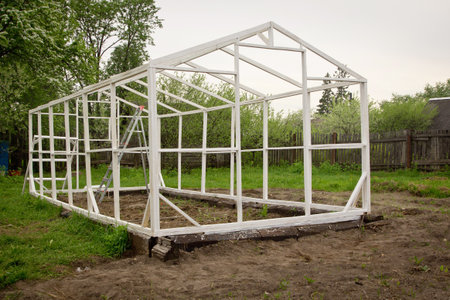 Construction of a small greenhouse in a garden

の写真素材
