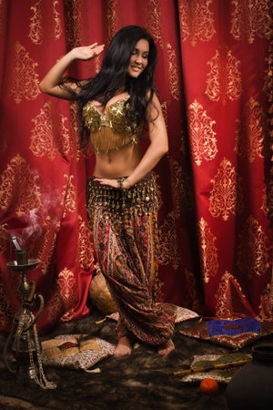 Arabic woman belly dancer dancingの写真素材