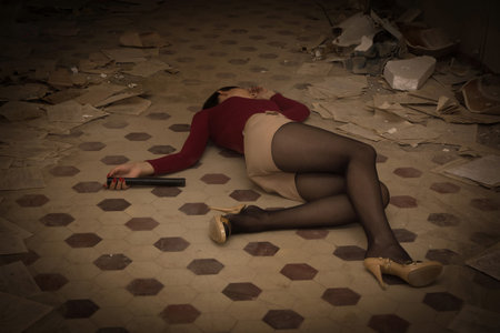 Lifeless brunette in red lying on the floor
の写真素材