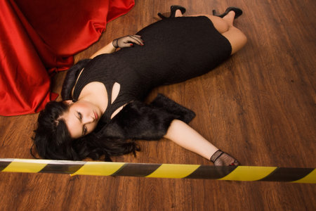 Crime scene in a vintage style. Victim lying on the floorの写真素材