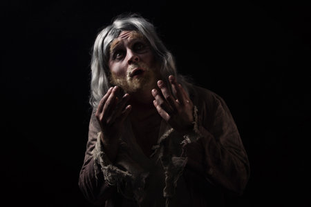Hobo. Emotional portrait of the gray-haired tramp
の写真素材
