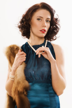 Retro portrait of beautiful woman. Vintage style.の写真素材