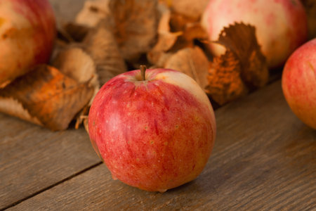 Red ripe apples on a table