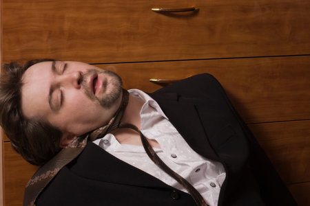 Corpse of strangled business manの写真素材