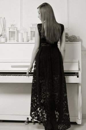Portrait of the beautiful girl in the vintage interiorの写真素材