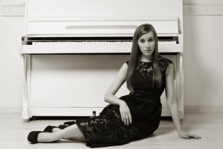 Portrait of the beautiful girl in the vintage interiorの写真素材