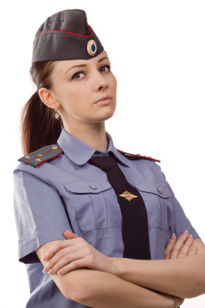 Russian woman police officer in uniform over whiteの写真素材