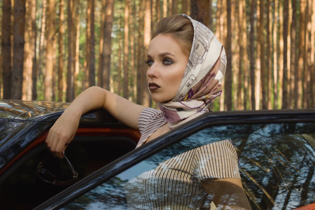 Fashion vintage woman standing near vehicle with opened door