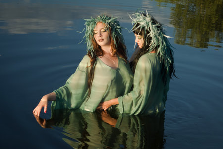 Two mermaids on the forest lake