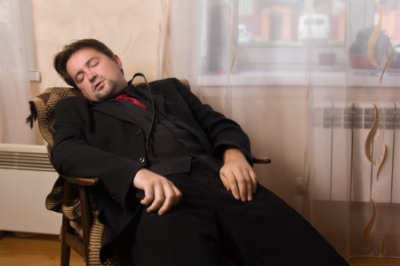 Corpse of killed business in a bedroomの写真素材