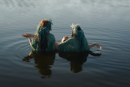 Love between handsome men and two beautiful mermaidsの写真素材