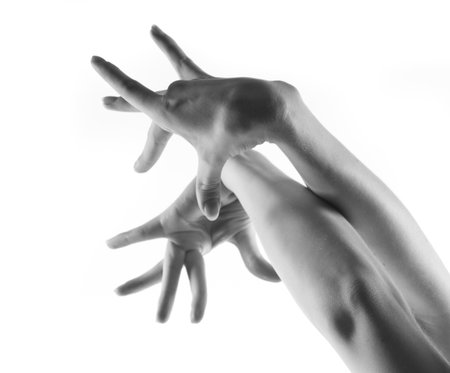 Parts of body.  Ballet dancer hands over white