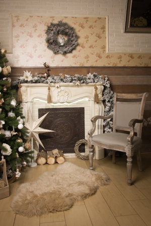 Fireplace with beautiful Christmas decorations in roomの写真素材