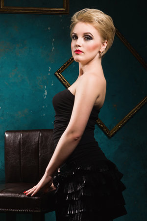 Sensual pretty woman in the vintage interior