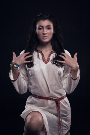 Witch in the water. Fantasy girl. Mysterious Night scene.の写真素材