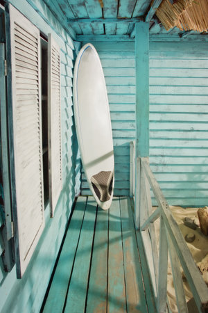 Summertime. Sandy beach. Palm bungalows on white sand beach.の写真素材