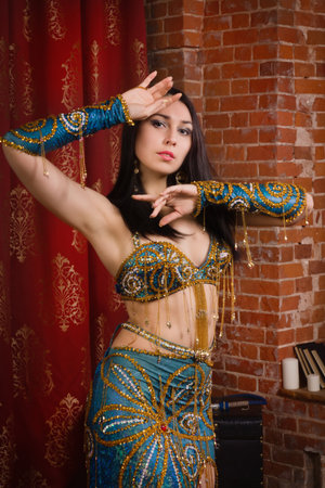 Beautiful traditional female dancer. Oriental dancer woman. Belly dancing.の写真素材