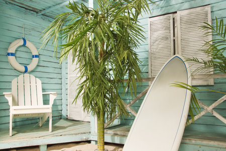 Summertime. Sandy beach. Palm bungalows on white sand beach.の写真素材