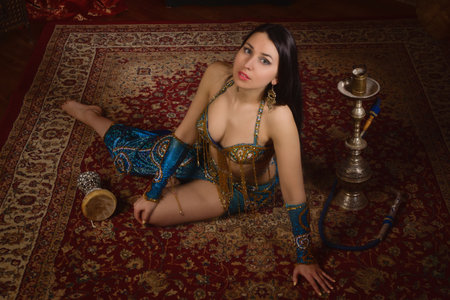 Beautiful traditional female dancer. Oriental dancer woman. Belly dancing.の写真素材