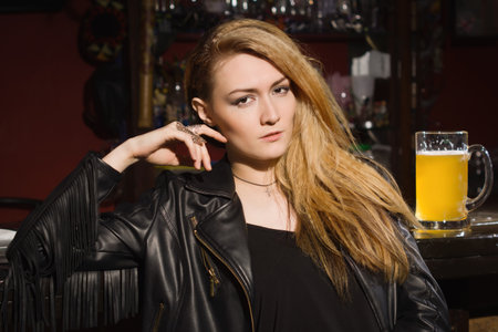 Beautiful rock girl partying at rock clubの写真素材