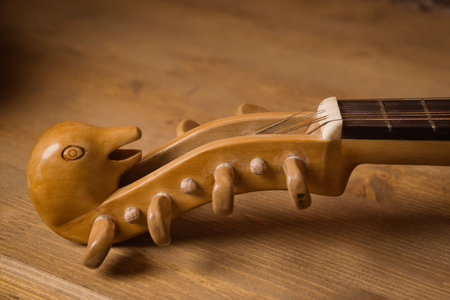 Renaissance lute (citole) in a dark room. Close up detailの写真素材