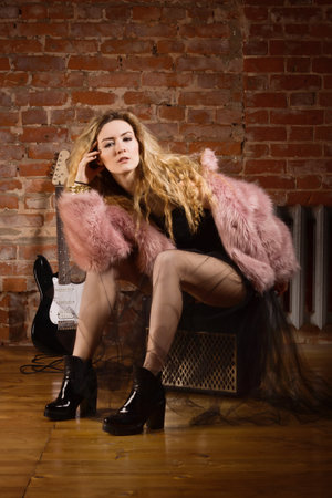 Beautiful rock girl partying at rock clubの写真素材