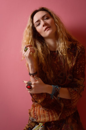 Hippie girl. Rock star in a fashion style 60thの写真素材