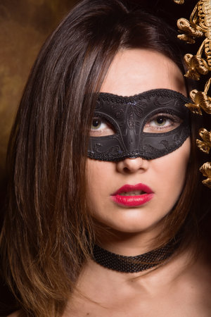 Beautiful dominant brunette mistress girl in black lingerieの写真素材