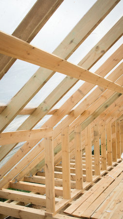 Construction of the roof of the house. Frame elements