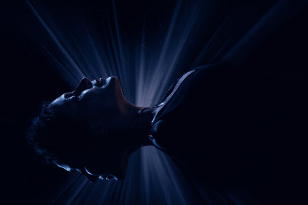 Young woman lying in a water in a poetic representation.
の写真素材