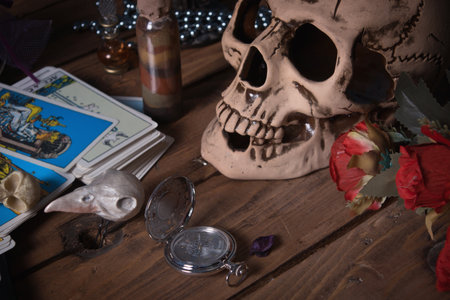 Helloween. Mystic still life with skull, tarot cards, books and candles