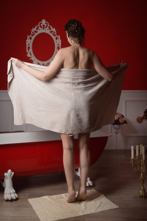 Beautiful sexy woman in a  bathroom. Spa body care.
の写真素材