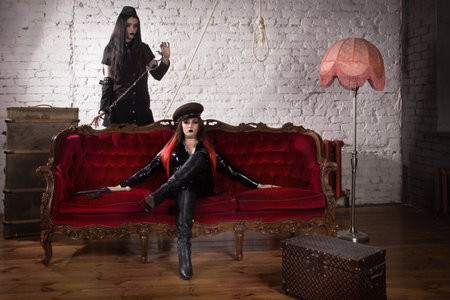 Two fetish models in a military uniformの写真素材