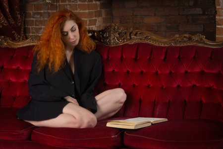 Sexual emotional redhead woman in the vintage interiorの写真素材