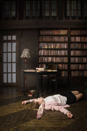 Crime scene (imitation). Strangled student in the classical library room