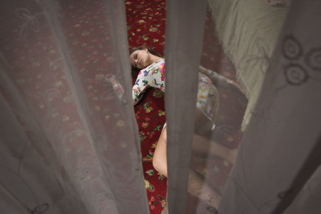 Crime scene. Young woman killed by an arrow from a bowの写真素材