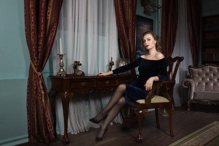 Beautiful attractive woman in the vintage interiorの写真素材