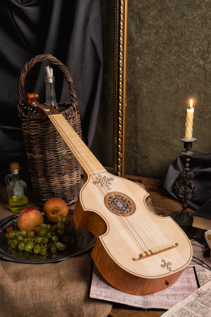 Musical still life in the Renaissance style with violaの写真素材